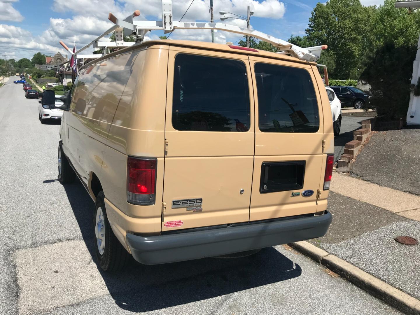 2011 Tan /Gray Ford E-Series Van E250 (1FTNE2EW5BD) with an 4.8 V8 engine, Automatic transmission, located at 577 Chester Pike, Prospect Park, PA, 19076, (610) 237-1015, 39.886154, -75.302338 - Photo#5